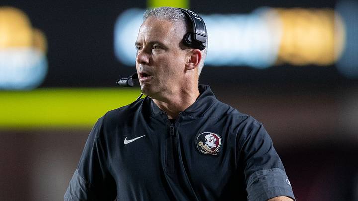Florida State Seminoles head coach Mike Norvell talks into his headset during a timeout. The Florida State Seminoles defeated the New Mexico State Aggies 34-17 at Doak Campbell Stadium on Saturday, Aug. 29, 2026. Florida State Seminoles head coach Mike Norvell talks into his headset during a timeout. The Florida State Seminoles defeated the New Mexico State Aggies 34-17 at Doak Campbell Stadium on Saturday, Aug. 29, 2026.