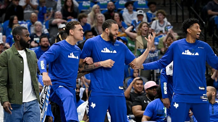 Apr 9, 2023; Dallas, Texas, USA; Dallas Mavericks forward Tim Hardaway Jr. (11) and center Dwight Powell (7) and center JaVale McGee (00) and forward Christian Wood (35) celebrate on the team bench during the second quarter against the San Antonio Spurs at the American Airlines Center. Mandatory Credit: Jerome Miron-Imagn Images Apr 9, 2023; Dallas, Texas, USA; Dallas Mavericks forward Tim Hardaway Jr. (11) and center Dwight Powell (7) and center JaVale McGee (00) and forward Christian Wood (35) celebrate on the team bench during the second quarter against the San Antonio Spurs at the American Airlines Center. Mandatory Credit: Jerome Miron-Imagn Images