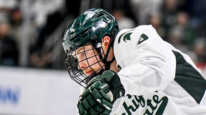Michigan State's Matt Basgall shoots the puck against Michigan during the third period on Friday, Dec. 5, 2025, at Munn Ice Arena in East Lansing.