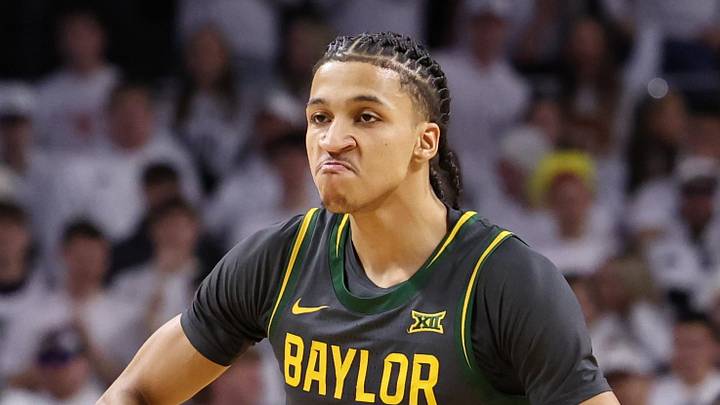 Feb 7, 2026; Ames, Iowa, USA; Baylor Bears guard Cameron Carr (43) celebrates are a basket against the Iowa State Cyclones during the first half at James H. Hilton Coliseum. Mandatory Credit: Reese Strickland-Imagn Images