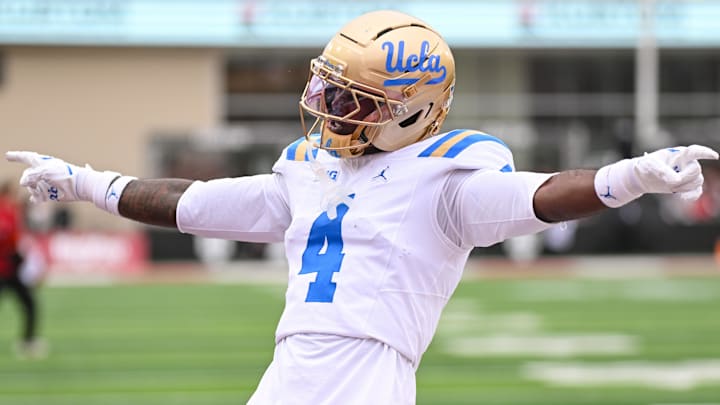 Oct 25, 2025; Bloomington, Indiana, USA; UCLA Bruins defensive back Key Lawrence (4) celebrates after a play during the first half against the Indiana Hoosiers at Memorial Stadium. Mandatory Credit: Robert Goddin-Imagn Images