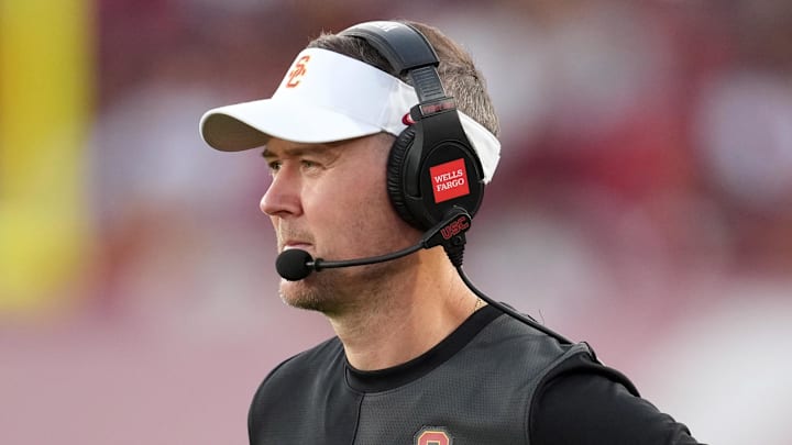 Aug 30, 2025; Los Angeles, California, USA; Southern California Trojans head coach Lincoln Riley watches from the sidelines against the Missouri State Bears in the first half at United Airlines Field at Los Angeles Memorial Coliseum. Mandatory Credit: Kirby Lee-Imagn Images