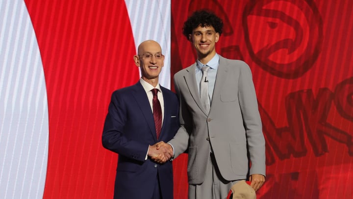 Zaccharie Risacher poses for photos with NBA commissioner Adam Silver after being selected by the Atlanta Hawks with the No. 1 pick of the 2024 NBA draft. Zaccharie Risacher poses for photos with NBA commissioner Adam Silver after being selected by the Atlanta Hawks with the No. 1 pick of the 2024 NBA draft.
