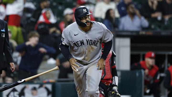 Aug 29, 2025; Chicago, Illinois, USA; New York Yankees center fielder Trent Grisham (12) watches his grand slam against the Chicago White Sox during the fourth inning at Rate Field. Mandatory Credit: Kamil Krzaczynski-Imagn Images