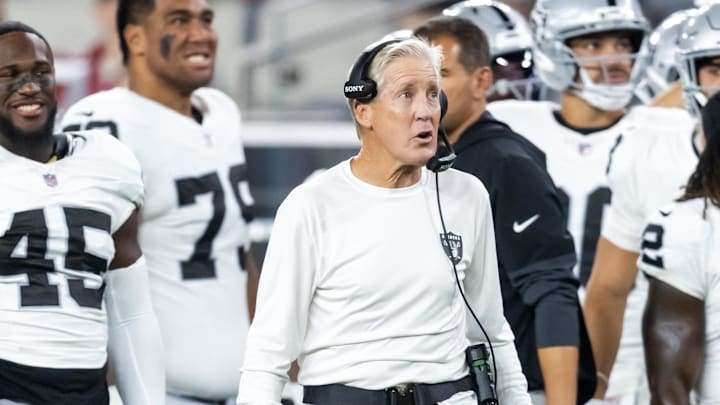Aug 23, 2025; Glendale, Arizona, USA; Las Vegas Raiders head coach Pete Carroll with linebacker Devin White (45) and running back Ashton Jeanty (2) against the Arizona Cardinals during a preseason NFL game at State Farm Stadium. Mandatory Credit: Mark J. Rebilas-Imagn Images