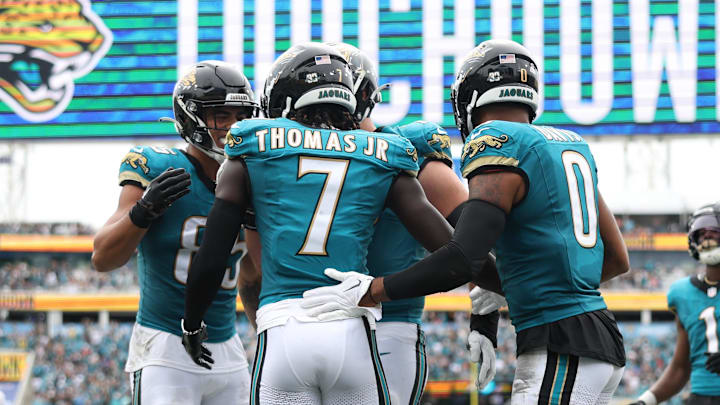 Oct 6, 2024; Jacksonville, Florida, USA; Jacksonville Jaguars wide receiver Brian Thomas Jr. (7) celebrates after scoring a touchdown against the Indianapolis Colts in the second quarter at EverBank Stadium. Mandatory Credit: Nathan Ray Seebeck-Imagn Images