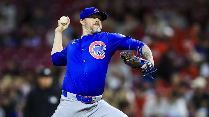 May 23, 2025; Cincinnati, Ohio, USA; Chicago Cubs relief pitcher Ryan Pressly (55) pitches against the Cincinnati Reds in the ninth inning at Great American Ball Park. 