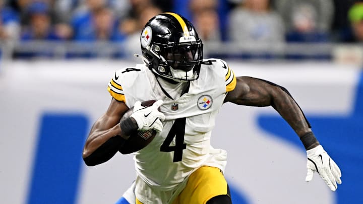 Dec 21, 2025; Detroit, Michigan, USA; Detroit Lions cornerback Rock Ya-Sin (23) tackles Pittsburgh Steelers wide receiver DK Metcalf (4) during the fourth quarter at Ford Field. Mandatory Credit: Lon Horwedel-Imagn Images