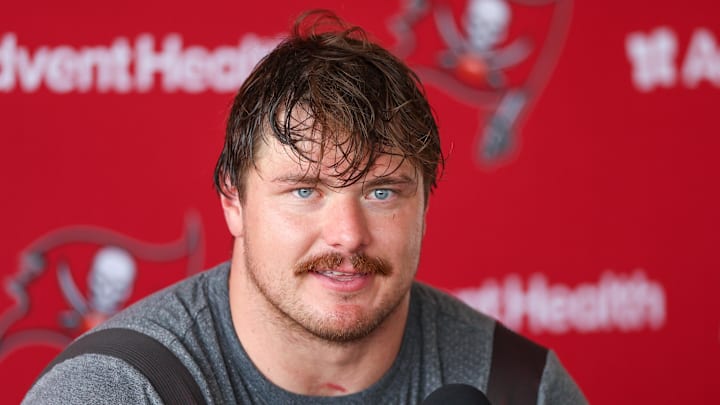 Tampa Bay Buccaneers offensive tackle Luke Goedeke (67) talks to media after training camp 