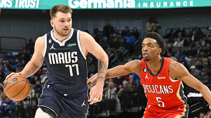 Feb 2, 2023; Dallas, Texas, USA; Dallas Mavericks guard Luka Doncic (77) and New Orleans Pelicans forward Herbert Jones (5) in action during the game between the Dallas Mavericks and the New Orleans Pelicans at American Airlines Center. Mandatory Credit: Jerome Miron-Imagn Images Feb 2, 2023; Dallas, Texas, USA; Dallas Mavericks guard Luka Doncic (77) and New Orleans Pelicans forward Herbert Jones (5) in action during the game between the Dallas Mavericks and the New Orleans Pelicans at American Airlines Center. Mandatory Credit: Jerome Miron-Imagn Images