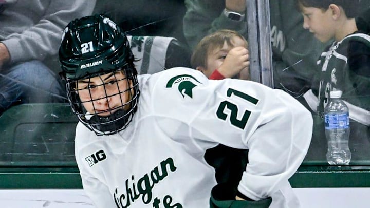Michigan State's Anthony Romani moves the puck against New Hampshire during the second period on Thursday, Oct. 9, 2025, at Munn Ice Arena in East Lansing. Michigan State's Anthony Romani moves the puck against New Hampshire during the second period on Thursday, Oct. 9, 2025, at Munn Ice Arena in East Lansing.