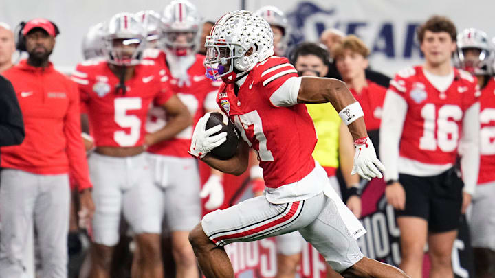 Ohio State Buckeyes wide receiver Carnell Tate (17) runs after a catch during the Cotton Bowl at AT&T Stadium in Arlington, Texas for the College Football Playoff quarterfinal game against the Miami Hurricanes on Dec. 31, 2025. Ohio State lost 24-14. Ohio State Buckeyes wide receiver Carnell Tate (17) runs after a catch during the Cotton Bowl at AT&T Stadium in Arlington, Texas for the College Football Playoff quarterfinal game against the Miami Hurricanes on Dec. 31, 2025. Ohio State lost 24-14.