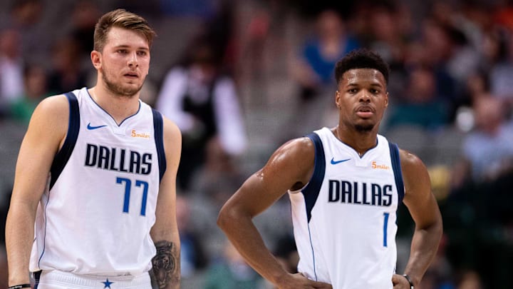 Oct 12, 2018; Dallas, TX, USA; Dallas Mavericks guard Luka Doncic (77) and guard Dennis Smith Jr. (1) in action during the game against the Charlotte Hornets at American Airlines Center. Mandatory Credit: Jerome Miron-Imagn Images Oct 12, 2018; Dallas, TX, USA; Dallas Mavericks guard Luka Doncic (77) and guard Dennis Smith Jr. (1) in action during the game against the Charlotte Hornets at American Airlines Center. Mandatory Credit: Jerome Miron-Imagn Images