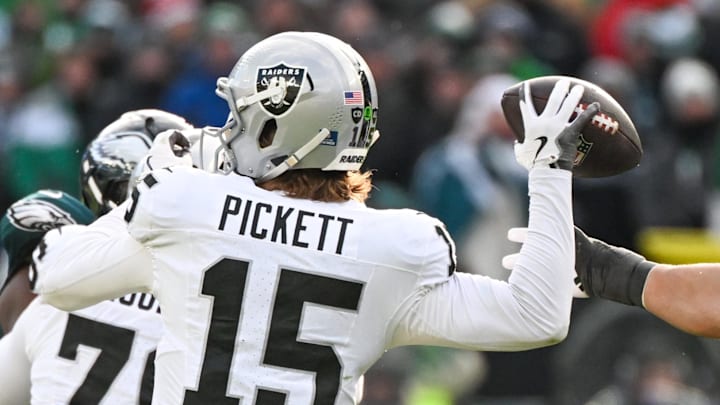 Dec 14, 2025; Philadelphia, Pennsylvania, USA; Las Vegas Raiders quarterback Kenny Pickett (15) throws the ball as Philadelphia Eagles linebacker Jaelan Phillips (50) attempts to block during the second quarter at Lincoln Financial Field. Mandatory Credit: Eric Hartline-Imagn Images Dec 14, 2025; Philadelphia, Pennsylvania, USA; Las Vegas Raiders quarterback Kenny Pickett (15) throws the ball as Philadelphia Eagles linebacker Jaelan Phillips (50) attempts to block during the second quarter at Lincoln Financial Field. Mandatory Credit: Eric Hartline-Imagn Images