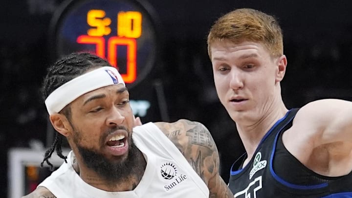 Toronto Raptors forward Brandon Ingram drives to the net against Detroit Pistons guard Kevin Huerter. Toronto Raptors forward Brandon Ingram drives to the net against Detroit Pistons guard Kevin Huerter.
