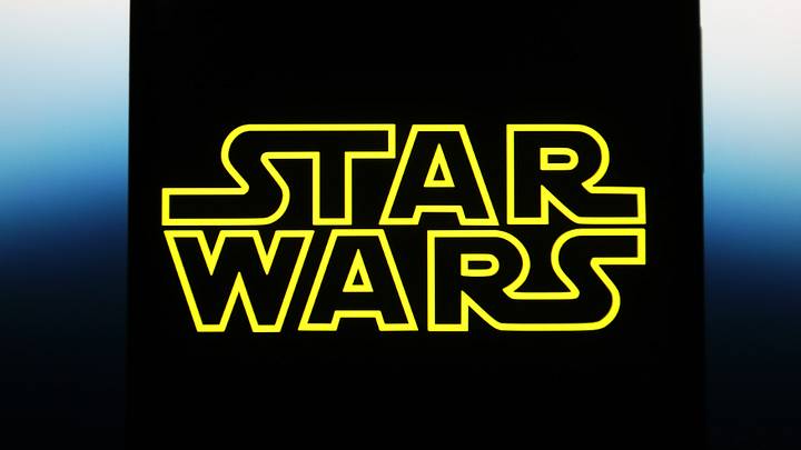 UKRAINE - 2023/05/13: In this photo illustration, a Star Wars logo is seen on a smartphone screen. UKRAINE - 2023/05/13: In this photo illustration, a Star Wars logo is seen on a smartphone screen.