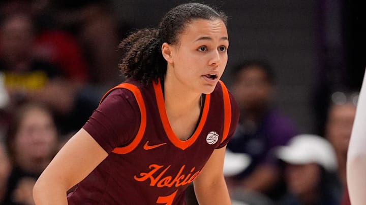 Nov 10, 2024; Charlotte, NC, USA; Virginia Tech Hokies guard Mackenzie Nelson (3) back on defense against Iowa Hawkeyes guard Lucy Olsen (33) during the second half at Spectrum Center. Mandatory Credit: Jim Dedmon-Imagn Images Nov 10, 2024; Charlotte, NC, USA; Virginia Tech Hokies guard Mackenzie Nelson (3) back on defense against Iowa Hawkeyes guard Lucy Olsen (33) during the second half at Spectrum Center. Mandatory Credit: Jim Dedmon-Imagn Images