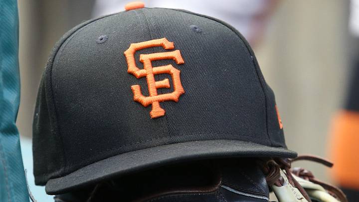 Jul 14, 2023; Pittsburgh, Pennsylvania, USA;  San Francisco Giants hat and glove on the bench against the Pittsburgh Pirates during the first inning at PNC Park. 