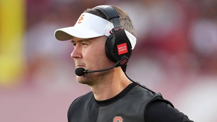 Aug 30, 2025; Los Angeles, California, USA; Southern California Trojans head coach Lincoln Riley watches from the sidelines against the Missouri State Bears in the first half at United Airlines Field at Los Angeles Memorial Coliseum. Mandatory Credit: Kirby Lee-Imagn Images