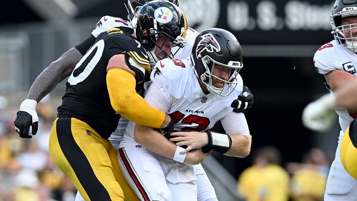 Sep 13, 2026; Pittsburgh, Pennsylvania, USA;  Pittsburgh Steelers linebacker T.J. Watt (90) sacks Atlanta Falcons quarterback Cooper Rush (13) during the third quarter at Acrisure Stadium.  Mandatory Credit: Barry Reeger-Imagn Images