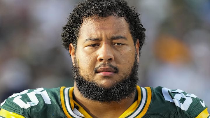 Sep 7, 2025; Green Bay, Wisconsin, USA;  Green Bay Packers guard Aaron Banks (65) during the game against the Detroit Lions at Lambeau Field.