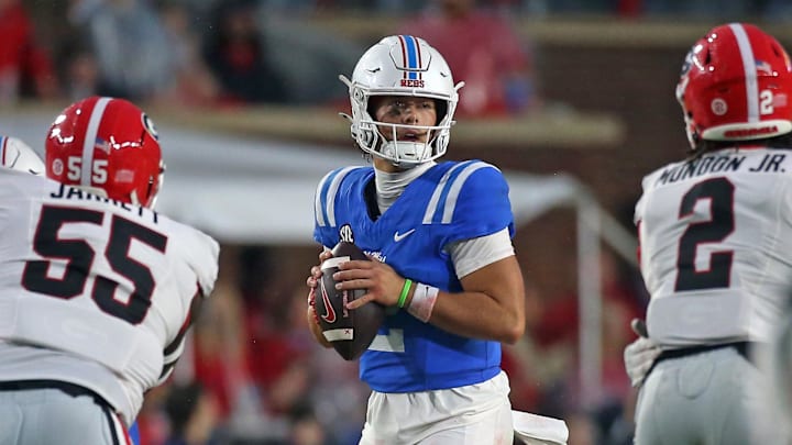 Nov 9, 2024; Oxford, Mississippi, USA; Mississippi Rebels quarterback Jaxson Dart (2) drops back to pass during the second half against the Georgia Bulldogs at Vaught-Hemingway Stadium. Mandatory Credit: Petre Thomas-Imagn Images Nov 9, 2024; Oxford, Mississippi, USA; Mississippi Rebels quarterback Jaxson Dart (2) drops back to pass during the second half against the Georgia Bulldogs at Vaught-Hemingway Stadium. Mandatory Credit: Petre Thomas-Imagn Images