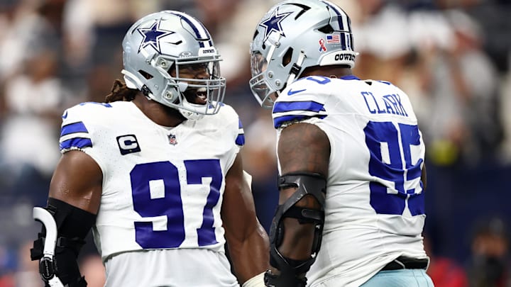 Dallas Cowboys DT Osa Odighizuwa celebrates with DT Kenny Clark after a play against the New York Giants.