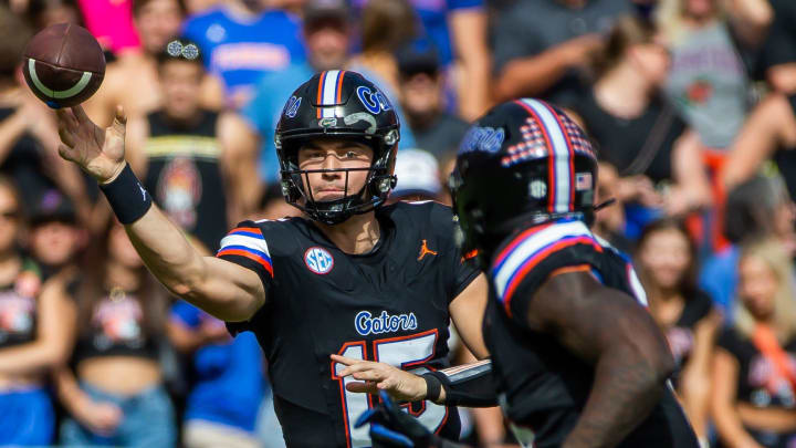 Florida Gators quarterback Graham Mertz (15) passes to Florida Gators running back Montrell Johnson Jr. (2) at Steve Spurrier Field at Ben Hill Griffin Stadium in Gainesville, FL on Saturday, November 4, 2023 in the second half. Arkansas defeated Florida 39-36 in over-time.