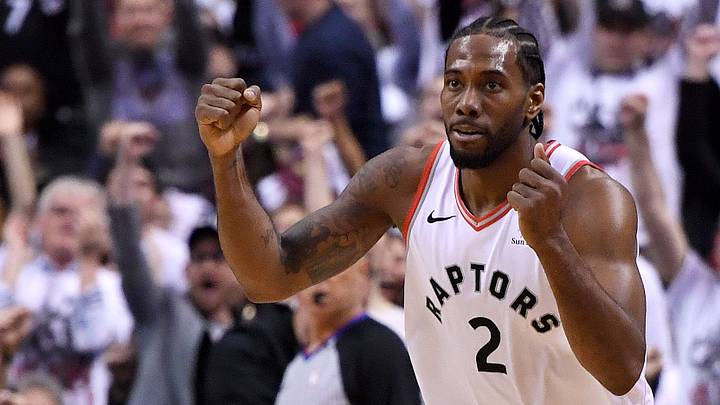 May 12, 2019; Toronto, Ontario, CAN;   Toronto Raptors forward Kawhi Leonard (2) reacts after making a basket against the Philadelphia 76ers in game seven of the second round of the 2019 NBA Playoffs at Scotiabank Arena. Mandatory Credit: Dan Hamilton-USA TODAY Sports