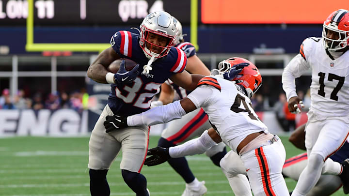 Oct 26, 2025; Foxborough, Massachusetts, USA;  Cleveland Browns linebacker Mohamoud Diabate (43) tackesl New England Patriots running back Treveyon Henderson (32) during the fourth quarter at Gillette Stadium. Mandatory Credit: Bob DeChiara-Imagn Images