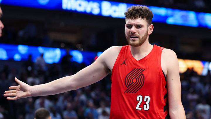 Nov 16, 2025; Dallas, Texas, USA; Portland Trail Blazers center Donovan Clingan (23) and Portland Trail Blazers forward Toumani Camara (33) react against the Dallas Mavericks in overtime at American Airlines Center. Mandatory Credit: Kevin Jairaj-Imagn Images