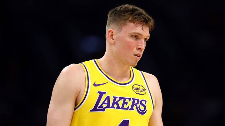 Oct 14, 2025; Phoenix, Arizona, USA; Los Angeles Lakers guard Dalton Knecht (4) against the Phoenix Suns during an NBA preseason game at Mortgage Matchup Center. Mandatory Credit: Mark J. Rebilas-Imagn Images Oct 14, 2025; Phoenix, Arizona, USA; Los Angeles Lakers guard Dalton Knecht (4) against the Phoenix Suns during an NBA preseason game at Mortgage Matchup Center. Mandatory Credit: Mark J. Rebilas-Imagn Images