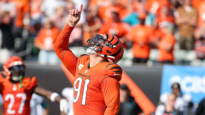 Sep 14, 2025; Cincinnati, Ohio, USA;  Cincinnati Bengals defensive end Trey Hendrickson (91) celebrates his sack during the fourth quarter against the Jacksonville Jaguars at Paycor Stadium. Mandatory Credit: Joseph Maiorana-Imagn Images