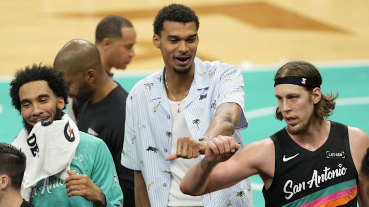 Nov 20, 2025; San Antonio, Texas, USA; San Antonio Spurs forward Victor Wembanyama (1) with teammates forwards Julian Champagnie (30) and Kelly Olynyk (8) during a time out in the first half against the Atlanta Hawks at Frost Bank Center. Nov 20, 2025; San Antonio, Texas, USA; San Antonio Spurs forward Victor Wembanyama (1) with teammates forwards Julian Champagnie (30) and Kelly Olynyk (8) during a time out in the first half against the Atlanta Hawks at Frost Bank Center.