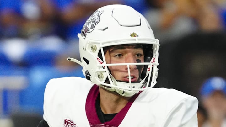 Sep 9, 2023; Durham, North Carolina, USA;  Lafayette Leopards quarterback Dean DeNobile (16) rolls out of the pocket against the Duke Blue Devils during the first half at Wallace Wade Stadium. Mandatory Credit: James Guillory-Imagn Images