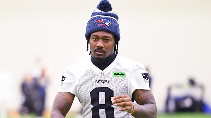 Jun 10, 2025; Foxborough, MA, USA; New England Patriots wide receiver Stefon Diggs (8) walks to the podium to speak to the media after minicamp held in the WIN Field House at Gillette Stadium. Mandatory Credit: Eric Canha-Imagn Images