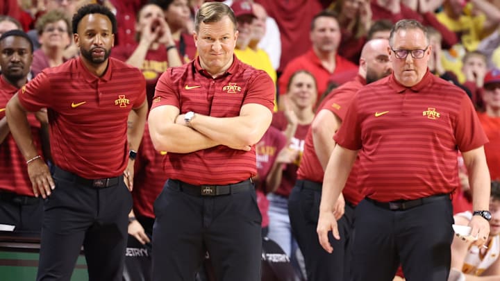 Mar 4, 2025; Ames, Iowa, USA;  Iowa State Cyclones head coach T.J. Otzelberger, JR Blount and Kyle Green watch the Cyclones play the Brigham Young Cougars during the second half at James H. Hilton Coliseum.