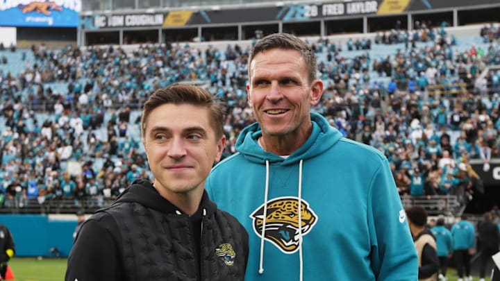 Jan 4, 2026; Jacksonville, Florida, USA; Jacksonville Jaguars general manager James Gladstone (left) and executive vice president of football operations Tony Boselli stand on the field after the game against the Tennessee Titans at EverBank Stadium. Mandatory Credit: Travis Register-Imagn Images