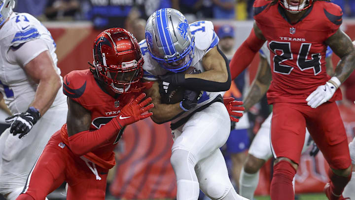 Detroit Lions wide receiver Amon-Ra St. Brown (14).