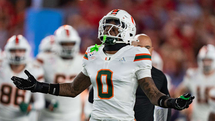 CHECK THIS DUPLICATE Miami Hurricanes defensive back Keionte Scott (0) runs onto the field at the start of the CFP Fiesta Bowl against Ole Miss at the State Farm Stadium, in Glendale, Ariz., on Thursday, Jan. 8, 2026.
