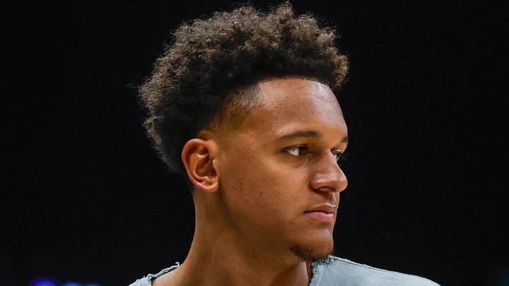 Aug 30, 2026; Seattle, Washington, USA; Orlando Magic guard Paolo Banchero watches from courtside the fourth quarter of a game between the Los Angeles Sparks and Seattle Storms at Climate Pledge Arena. Mandatory Credit: Joe Nicholson-Imagn Images