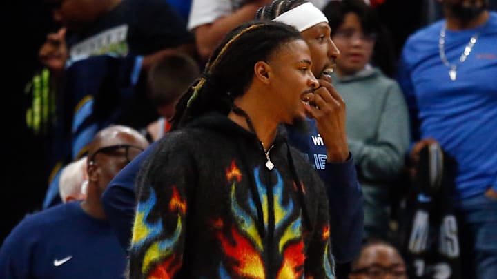 Oct 6, 2025; Memphis, Tennessee, USA; Memphis Grizzlies guard Ja Morant (12) looks on during the fourth quarter against the Detroit Pistons at FedExForum. Mandatory Credit: Petre Thomas-Imagn Images Oct 6, 2025; Memphis, Tennessee, USA; Memphis Grizzlies guard Ja Morant (12) looks on during the fourth quarter against the Detroit Pistons at FedExForum. Mandatory Credit: Petre Thomas-Imagn Images