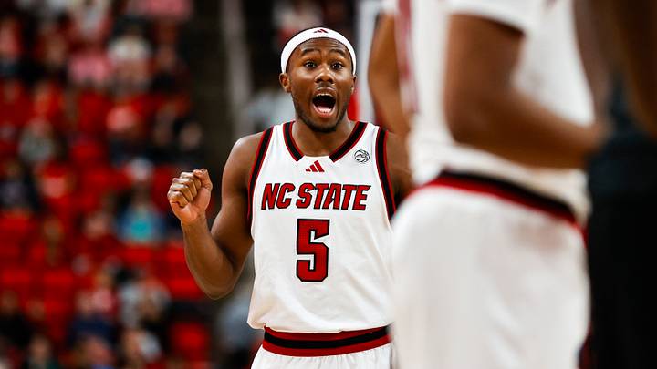 Dec 6, 2025; Raleigh, North Carolina, USA; NC State Wolfpack guard Tre Holloman (5). Dec 6, 2025; Raleigh, North Carolina, USA; NC State Wolfpack guard Tre Holloman (5).