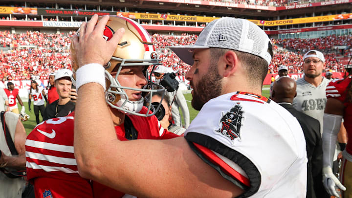 Nov 10, 2024; Tampa, Florida, USA; San Francisco 49ers quarterback Brock Purdy (13) greets Tampa Bay Buccaneers quarterback Baker Mayfield (6) after a game at Raymond James Stadium. Mandatory Credit: Nathan Ray Seebeck-Imagn Images