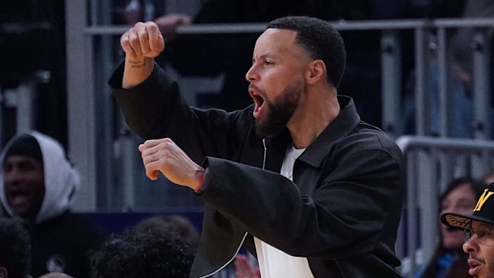 Feb 22, 2026; San Francisco, California, USA; Golden State Warriors guard Stephen Curry (30) cheers from the bench in the third quarter during a game against the Denver Nuggets at Chase Center. Mandatory Credit: David Gonzales-Imagn Images Feb 22, 2026; San Francisco, California, USA; Golden State Warriors guard Stephen Curry (30) cheers from the bench in the third quarter during a game against the Denver Nuggets at Chase Center. Mandatory Credit: David Gonzales-Imagn Images