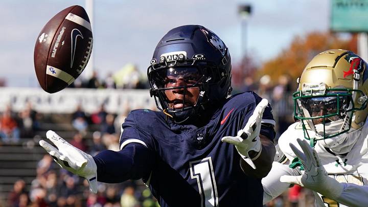 UConn Huskies wide receiver Skyler Bell (1) just misses the catch under pressure from UAB Blazers cornerback Tamarion Crumpley (13) and safety Sirad Bryant (1). UConn Huskies wide receiver Skyler Bell (1) just misses the catch under pressure from UAB Blazers cornerback Tamarion Crumpley (13) and safety Sirad Bryant (1).