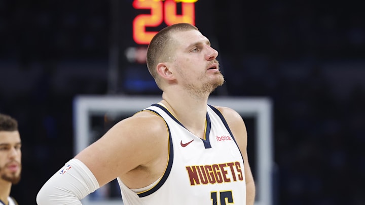 May 18, 2025; Oklahoma City, Oklahoma, USA; Denver Nuggets center Nikola Jokic (15) watches Oklahoma City Thunder guard Shai Gilgeous-Alexander shoot free throws in the second half of game seven of the second round for the 2025 NBA Playoffs at Paycom Center. May 18, 2025; Oklahoma City, Oklahoma, USA; Denver Nuggets center Nikola Jokic (15) watches Oklahoma City Thunder guard Shai Gilgeous-Alexander shoot free throws in the second half of game seven of the second round for the 2025 NBA Playoffs at Paycom Center.