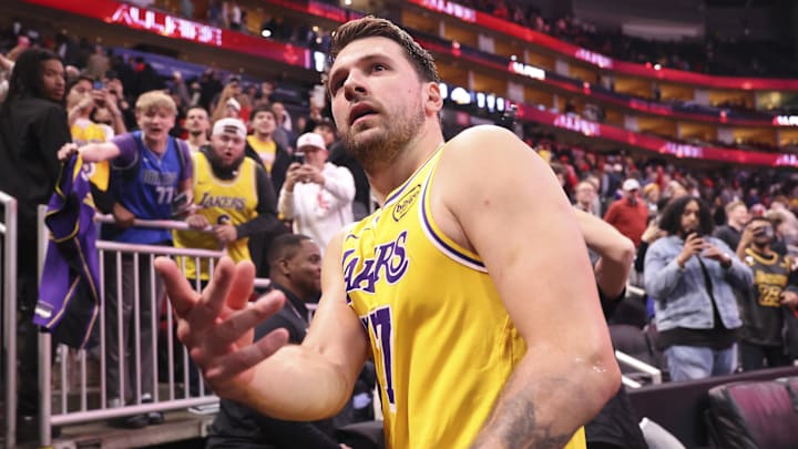 Mar 16, 2026; Houston, Texas, USA; Los Angeles Lakers guard Luka Doncic (77) throws a wrist band into the crowd after the game against the Houston Rockets at Toyota Center. Mandatory Credit: Troy Taormina-Imagn Images