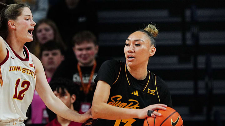 Iowa State Cyclones' guard Kenzie Hare (12) puts high pressure on Arizona State Sun Devils guard Last-Tear Poa (13) during the fourth quarter in the Big-12 women’s basketball at Hilton Coliseum on Feb. 18, 2026, in Ames, Iowa