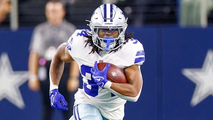 Aug 22, 2025; Arlington, Texas, USA; Dallas Cowboys running back Jaydon Blue (34) carries the ball during the fourth quarter against the Atlanta Falcons at AT&T Stadium. Mandatory Credit: Andrew Dieb-Imagn Images Aug 22, 2025; Arlington, Texas, USA; Dallas Cowboys running back Jaydon Blue (34) carries the ball during the fourth quarter against the Atlanta Falcons at AT&T Stadium. Mandatory Credit: Andrew Dieb-Imagn Images